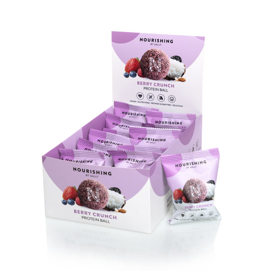 Display of Nourishing Berry Crunch protein balls packaging on a white background
